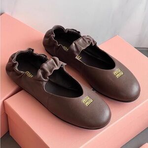 Miu Miu Brown Flats with Gold Logo